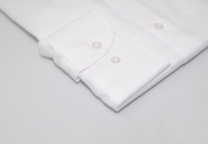 White tone on tone striped dress shirt sleeve